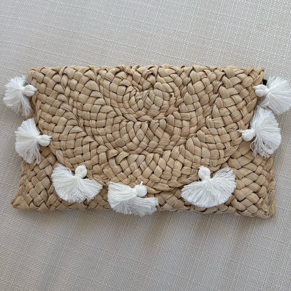 Straw clutch with white tassels